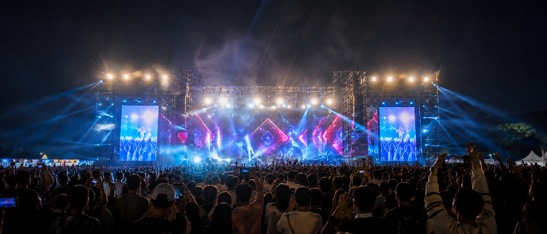 Concert stage lights at night representing a major event environment where RFID access control ensures operational efficiency Concert stage lights at night representing a major event environment where RFID access control ensures operational efficiency